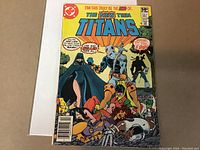 Front cover photo showing entire comic book with key characters on it, verifying title and condition.