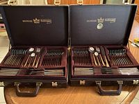 Two open cases side by side showing full contents