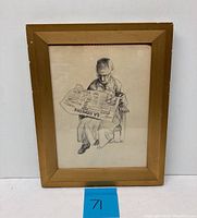 Full front view of framed drawing showing subject, frame and matting