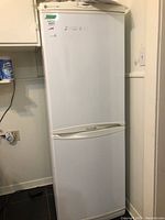 Front view of closed white LG fridge-freezer