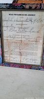 Full view of framed 1935 Coca-Cola contract receipt for cooler unit yearly rental.