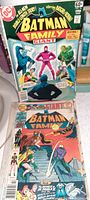 Two vintage Batman Family Giant comic books with colorful action covers showing Batman and supporting characters.