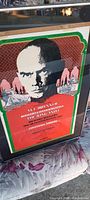 Photo of framed theatre poster showing Yul Brynner's portrait and text for The King and I