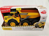 Boxed new Dickie Toys construction vehicle articulated hauler yellow and black with Volvo branding