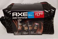 Front view of sealed Axe Dark Temptation gift bag with price tag and product window showing included items.