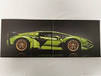 Two hardcover books displayed side by side, showing a green LEGO Technic Lamborghini car across the covers.