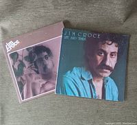 Two Jim Croce vinyl LP albums titled Life & Times and I Got a Name lying flat showing album covers