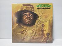 Front cover of James Brown's The Payback album featuring sepia illustration of James Brown and other art elements.