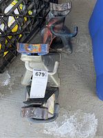 Three jack stands stacked together, showing wear and rust