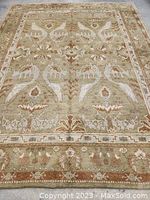 Full view of carpet laid flat showing overall pattern and size