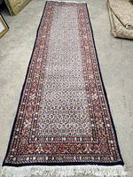 Full top-down view of the runner showing entire length, pattern and fringe