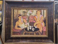 Full front view of framed painting showing both figures, table and frame