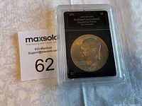 Front view of the encapsulated 1971 Brilliant Uncirculated Eisenhower Dollar coin showing obverse with Eisenhower portrait and grading label.