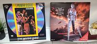 Two LaserDisc covers displayed side by side, Michael Jackson on right and The Pointer Sisters on left.