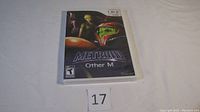 Front view of sealed Metroid: Other M Wii game case showing game artwork and rating.