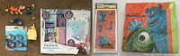 Photo of Disney toys including Elsa doll, Belle stamp figurine, Goofy figure, Dory whistles, Frozen II rubbing plates activity kits, Monsters, Inc stickers and napkins