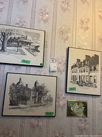 Three framed architectural drawings of Kingston buildings on a floral wallpaper background, showing placement and size distinction.