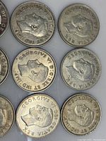 Nine Canadian half-dollars showing obverse portrait of King George VI