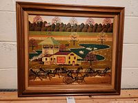 Front view of the framed oil painting showing a horse harness race with a grandstand and landscape background.