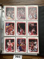 Page of SkyBox NBA trading cards featuring Clyde Drexler, Kevin Duckworth, Tim Hardaway, Kevin Johnson, Magic Johnson, Karl Malone, Chris Mullin, Terry Porter, David Robinson.