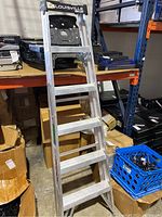 Full view of the 6-foot folding ladder showing aluminum construction and flat steps.