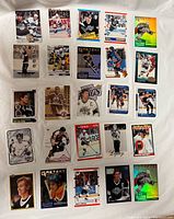 Photo showing 25 Wayne Gretzky hockey cards in a 5x5 grid layout on a white surface
