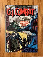 Front cover of G.I. Combat #135 comic book showing wartime scene and main title.