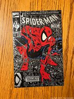 Front cover of Spider-Man #1 comic showing Spider-Man in red and blue costume, with text 'Torment part one of five'.