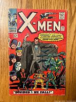 Front cover of Marvel's X-Men comic book issue 22 from July showing various characters and colorful artwork.