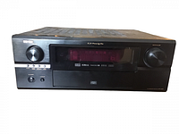 Front view of Denon receiver showing AL 24 Processing Plus branding, volume and function knobs, power button and display panel.