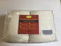 Front view of the polarfleece sheet set packaging showing brand, warmth level, and color.
