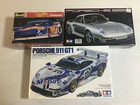 Lot of three new vintage model car kits from Japan, all factory sealed in original boxes.