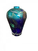 Front view showing blue and green swirl with silver aventurine flecks