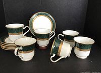 12 piece set of 6 bone china cups with matching saucers showing overall design and quantity.