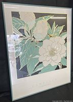 Full view of the framed lithograph showing the floral camellia image with matting and frame.