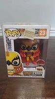 Front view of boxed Conan O'Brien Luchador Funko Pop figure with number 23 on the box.