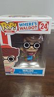 Front view of the Waldo Funko Pop vinyl figure in original box, showing the figure and branding.