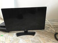 Front view of LG monitor showing screen and stand