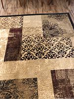 Close-up of central patchwork design showing color and pattern