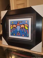 Front view of the professionally framed and matted fine art print "Healing Thunderbird" showing the colorful Thunderbird image.