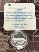 Photo of the coin with informational card detailing composition and features