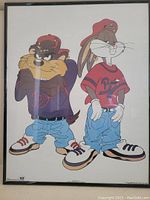 Framed poster featuring Bugs Bunny and Taz in streetwear, in a black frame.
