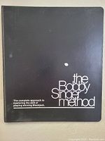 Front cover of the black binder showing the title 'the Bobby Singer method' and subtitle 'The complete approach to mastering the skill of playing winning Blackjack'.