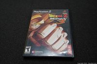 Front cover of Dragon Ball Z Budokai 3 game for PS2 showing game title, ESRB rating, and publisher Atari logo.