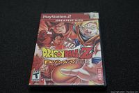 Front cover of Dragonball Z Budokai for PlayStation 2 Greatest Hits series showing game artwork and ESRB rating.