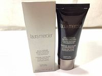 Photo of the foundation tube and box showing front with brand and product name.