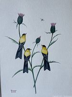 Close-up of the watercolor painting "Look" showing signature, three yellow and black birds perched on thistle, and small insect.