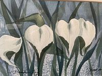 Close-up detail of the watercolor painting showing the signature and floral subject.
