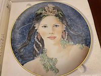 Front of the porcelain plate showing the painted portrait of Princess Marina with signature.