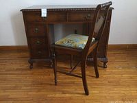Front view of the desk and chair showing overall appearance and style